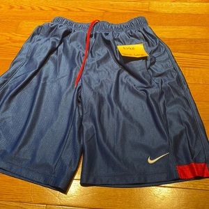 Nike athletic boys blue with red size large